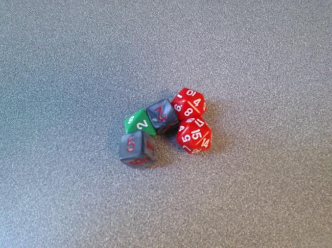 Set of dice that spells 'CODE'